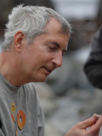 Rick examining a small rock